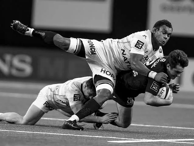 Plaquage en pleine action